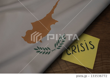 Cyprus flag and the word Crisis, concept of crisis in Cyprus 133536772