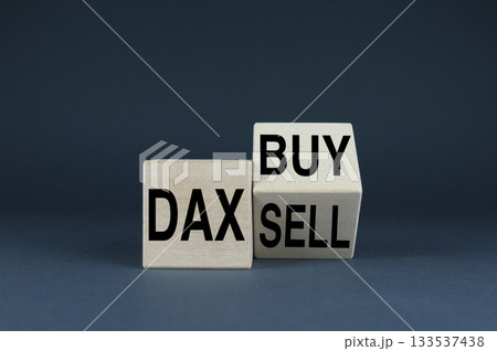 Dax buy or sell. The cubes form the words Dax buy or sell. 133537438
