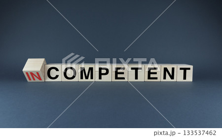 Cubes form the words Competent or Incompetent. Concept of behavior in business and at work 133537462