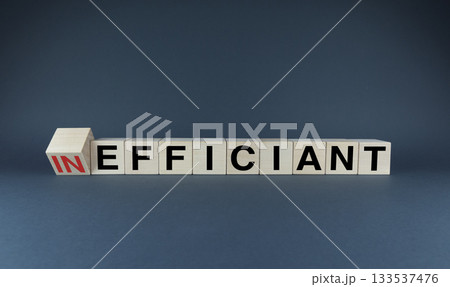 Cubes form words Inefficiant or efficiant. Concept of efficiency and productivity in both business and life Cubes form words Inefficiant or efficiant. Concept of efficiency and productivity in both business and life 133537476