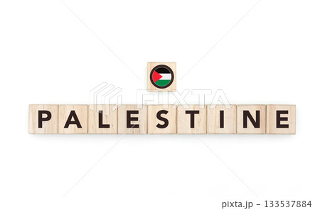 Wooden blocks bearing the name and flag of Palestine. Palestinian and Arab Culture, national identity, travel, and geography in a copy space design. Wooden blocks bearing the name and flag of Palestine. Palestinian and Arab Culture, national identity, travel, and geography in a copy space design. 133537884