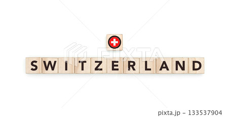 Wooden blocks bearing the name and flag of Switzerland. Swiss and European Culture, national identity, travel, and geography in a copy space design. Wooden blocks bearing the name and flag of Switzerland. Swiss and European Culture, national identity, travel, and geography in a copy space design. 133537904
