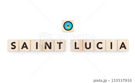 Wooden blocks bearing the name and flag of Saint Lucia. Saint Lucian and Caribbean Culture, national identity, travel, and geography in a copy space design. 133537910