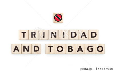 Wooden blocks bearing the name and flag of Trinidad And Tobago. Trinibagonian and Caribbean Culture, national identity, travel, and geography in a copy space design. 133537936