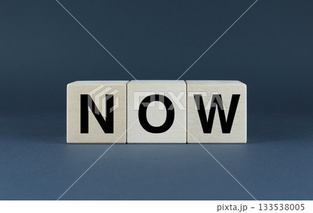 Now. Cubes form the word Now. 133538005