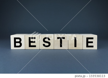 Bestie. Cubes form the word Bestie. Bestie word concept 133538113