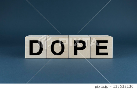 Dope. Cubes form the word Dope. A broad concept is the word Dope 133538130
