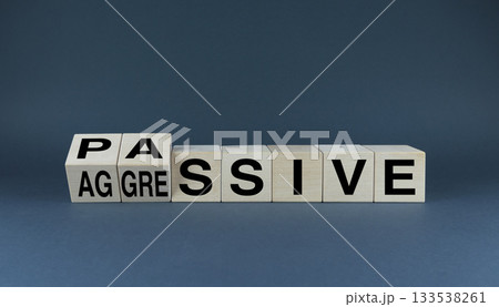 Passive or Aggressive Behavior. The cubes form the choice words Passive or Aggressive. Passive or Aggressive Behavior. The cubes form the choice words Passive or Aggressive. 133538261