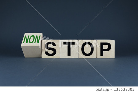 Stop or non-stop. Cubes form the words Stop to non-stop 133538303