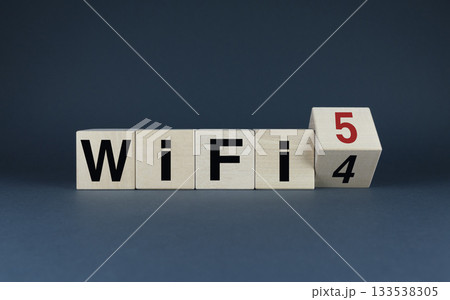 Cubes form the words Wi-Fi 4 to Wi-Fi 5. The concept of moving to the latest wireless network standards. 133538305
