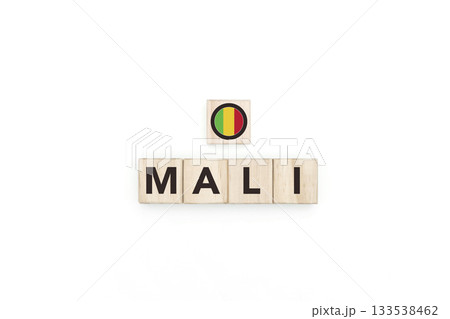 Wooden blocks bearing the name and flag of Mali. Malian and Islam Culture, national identity, travel, and geography in a copy space design. 133538462