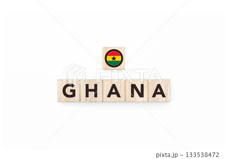 Wooden blocks bearing the name and flag of Ghana. Ghanaian and African Culture, national identity, travel, and geography in a copy space design. 133538472