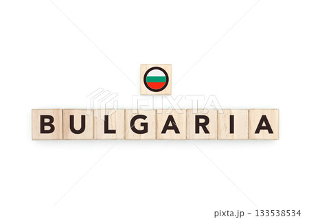 Wooden blocks bearing the name and flag of Bulgaria. Bulgarian and East European Culture, national identity, travel, and geography in a copy space design. Wooden blocks bearing the name and flag of Bulgaria. Bulgarian and East European Culture, national identity, travel, and geography in a copy space design. 133538534