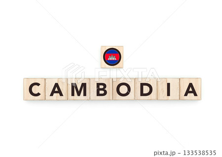 Wooden blocks bearing the name and flag of Cambodia. Cambodian and Asian Culture, national identity, travel, and geography in a copy space design. Wooden blocks bearing the name and flag of Cambodia. Cambodian and Asian Culture, national identity, travel, and geography in a copy space design. 133538535
