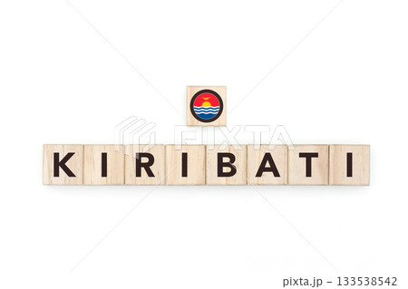 Wooden blocks bearing the name and flag of Kiribati. I-Kiribati and Polynesian Culture, national identity, travel, and geography in a copy space design. 133538542
