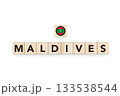 Wooden blocks bearing the name and flag of Maldivas. Maldivian and North Indian Culture, national identity, travel, and geography in a copy space design. 133538544