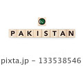 Wooden blocks bearing the name and flag of Pakistan. Pakistani, Islamic and Asian Culture, national identity, travel, and geography in a copy space design. 133538546