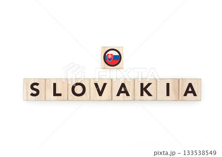 Wooden blocks bearing the name and flag of Slovakia. Slovak and East European Culture, national identity, travel, and geography in a copy space design. Wooden blocks bearing the name and flag of Slovakia. Slovak and East European Culture, national identity, travel, and geography in a copy space design. 133538549