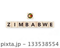 Wooden blocks bearing the name and flag of Zimbabwe. Zimbabwean and South African Culture, national identity, travel, and geography in a copy space design. 133538554