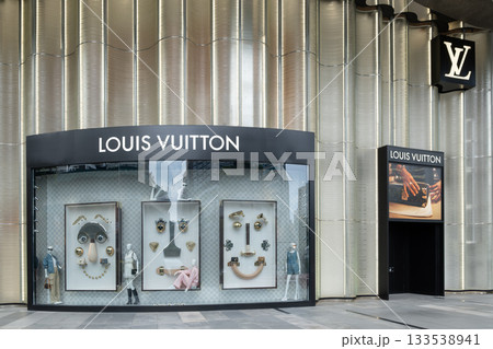 Louis Vuitton storefront display showcasing luxury accessories in Singapore Louis Vuitton storefront display showcasing luxury accessories in Singapore 133538941