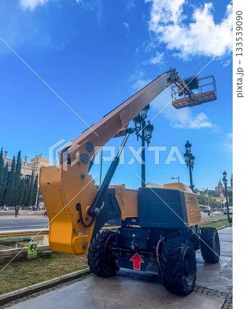 Boom Lift Machine on City Street 133539090