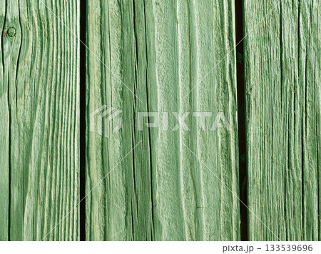 Green painted wooden slats background texture 133539696
