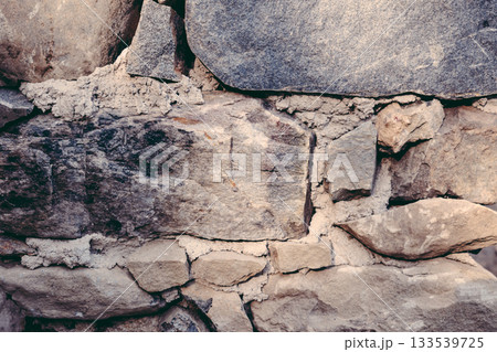 Ancient Cretan stone masonry with stones of different sizes Ancient Cretan stone masonry with stones of different sizes 133539725