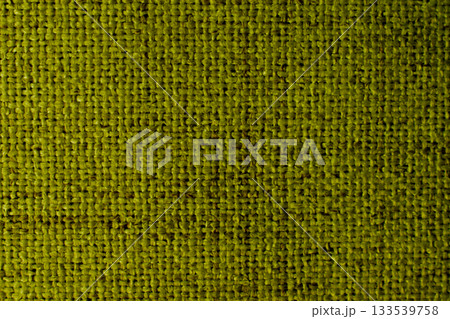 Yellow green fabric background, bookbinding cloth, overlapping threads 133539758