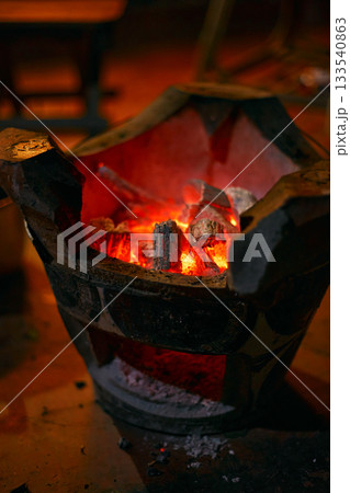 Red hot charcoal stove 133540863