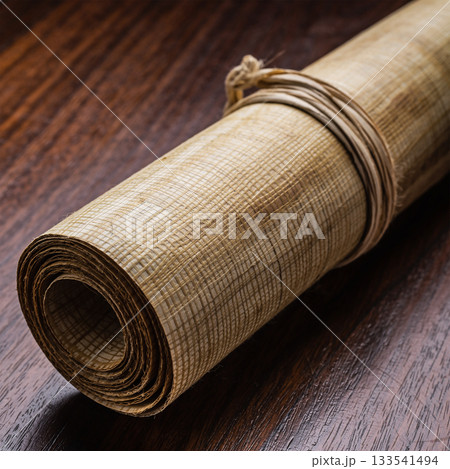 麻ひもで結ばれた古代の巻物：歴史と秘密を秘めたパピルス 133541494