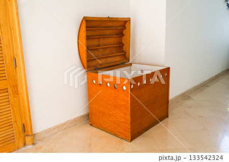 Large wooden chest with lid in the hotel hallway 133542324