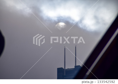 Full moon with dramatic cloudscape. Cloudy overcast sky with moon. Nature scene. 133542592