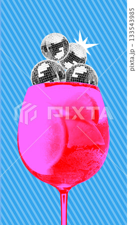 Playful poster of oversized cocktail glass filled with disco balls 133543985