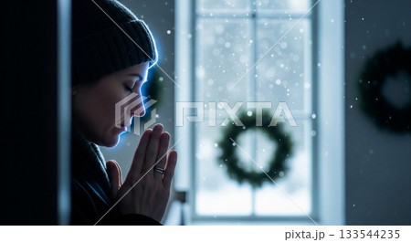 In a minimalist Scandinavian church, a person prays silently, hands clasped in front of their chest. Blue moonlight filters through a window, enhancing the tranquil atmosphere. In a minimalist Scandinavian church, a person prays silently, hands clasped in front of their chest. Blue moonlight filters through a window, enhancing the tranquil atmosphere. 133544235