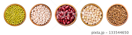 Canned legumes in wooden bowls. From left to right green peas, white beans, red kidney beans, chickpeas, and brown lentils, boiled and preserved, frequently used because of its versatility in dishes. Canned legumes in wooden bowls. From left to right green peas, white beans, red kidney beans, chickpeas, and brown lentils, boiled and preserved, frequently used because of its versatility in dishes. 133544650