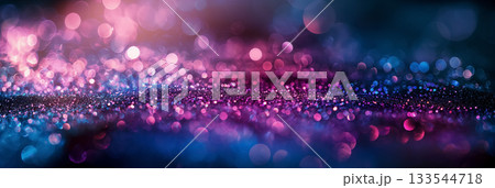 A panoramic view of vibrant bokeh lights with a mesmerizing blend of pink and blue hues creating a festive atmosphere. 133544718