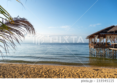Wooden pier on the beach of Lake Poso, Tentena, Sulawesi Wooden pier on the beach of Lake Poso, Tentena, Sulawesi 133545115