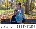 Lovely family in an autumn park. 133545159