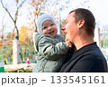 Joyful Father and Baby Moment 133545161