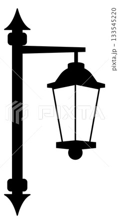A black and white lamp post with a lamp hanging from it A black and white lamp post with a lamp hanging from it 133545220