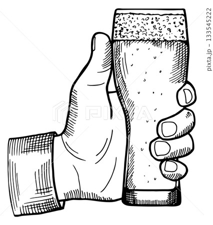 A hand holding a glass of beer 133545222