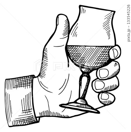 A hand holding a wine glass 133545226
