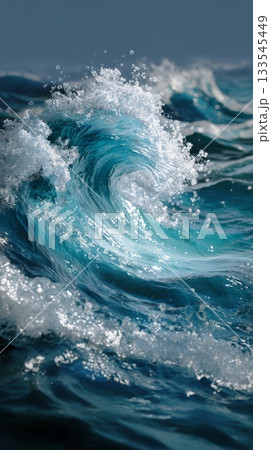 striking close-up of a vibrant blue ocean wave crashing, with white foam and spray sparkling in the sunlight, set against a blurred deep blue background 133545449