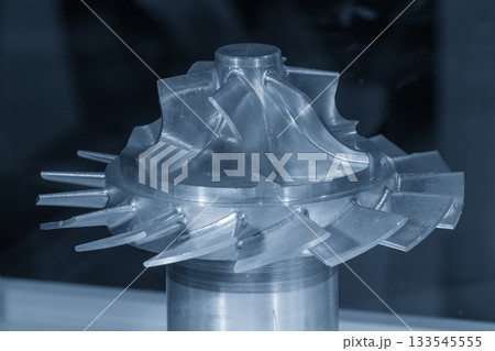 Close up scene the turbocharger part made by CNC milling machine method. 133545555
