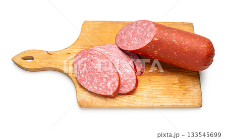 Smoked sausage on a kitchen board Smoked sausage on a kitchen board 133545699