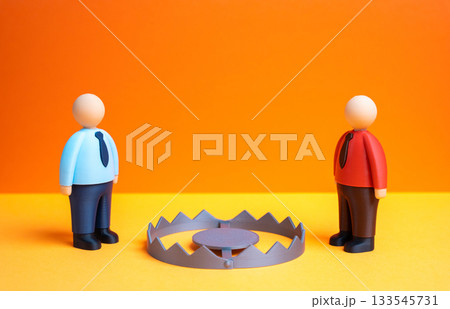 Two office workers are reluctant to start a conflict because of the potential consequences. Lack of trust between the parties. Workplace tension and fragile cooperation. Communication barriers 133545731