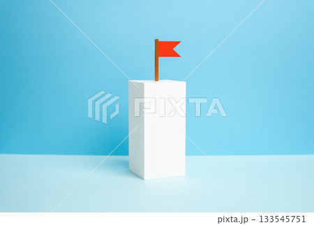 A pedestal with a target flag on a blue background. The target is in sight. Find the way to the top. Goal setting, achievement paths, and personal development. Business coaching, 133545751