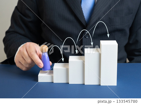 A businessman steps up a ladder. Career growth, stages of development. Corporate training, professional success stories and motivation. A businessman steps up a ladder. Career growth, stages of development. Corporate training, professional success stories and motivation. 133545780
