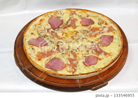 Pizza at Cutting Board Pizza at Cutting Board 133546955