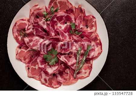 sliced cured ham, prosciutto, italian dish, delicacy, parma ham, top view, no people, 133547728